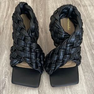 Black trendy heels in a size US 10 Women.